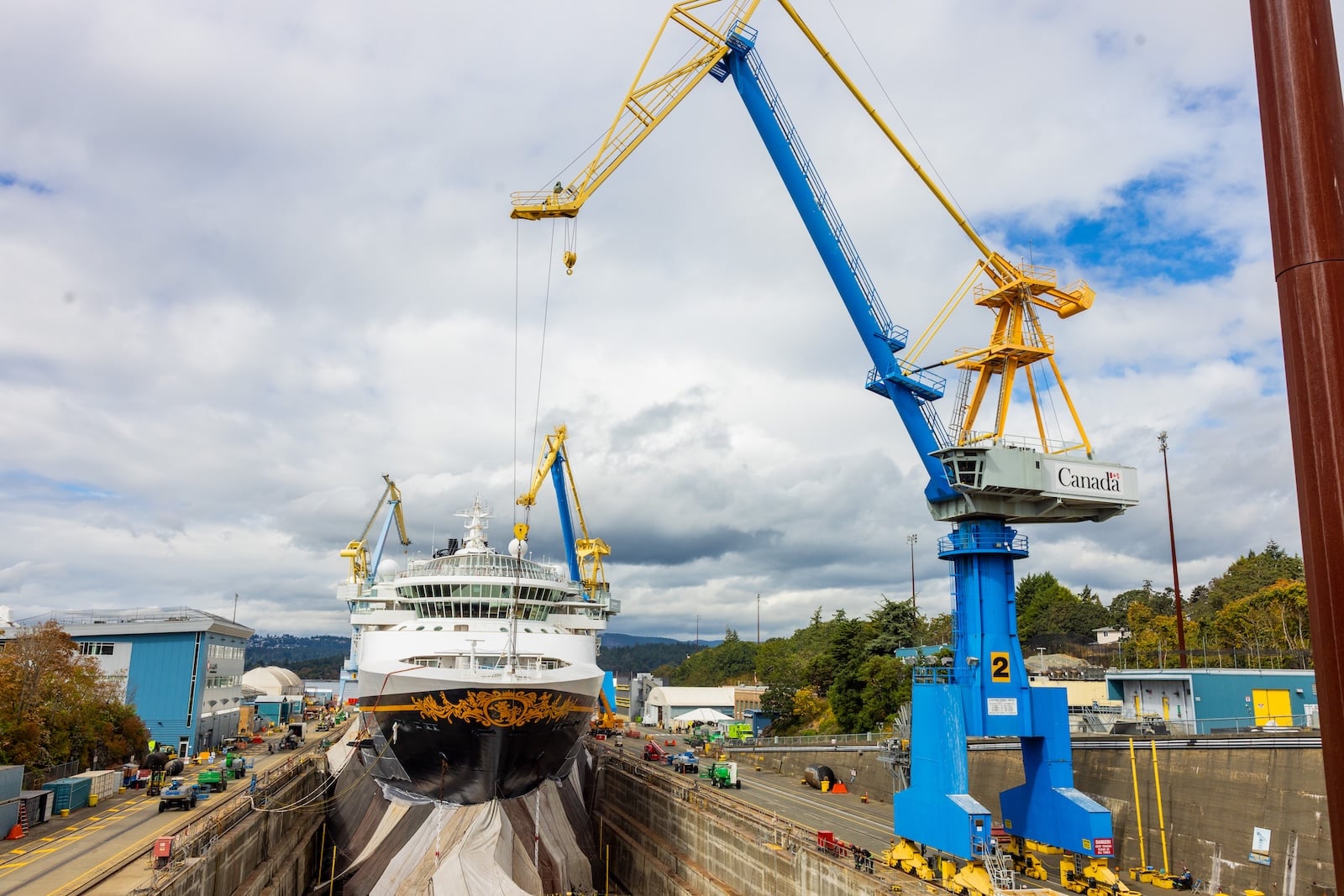 Workers performing maintenance on cruise ship