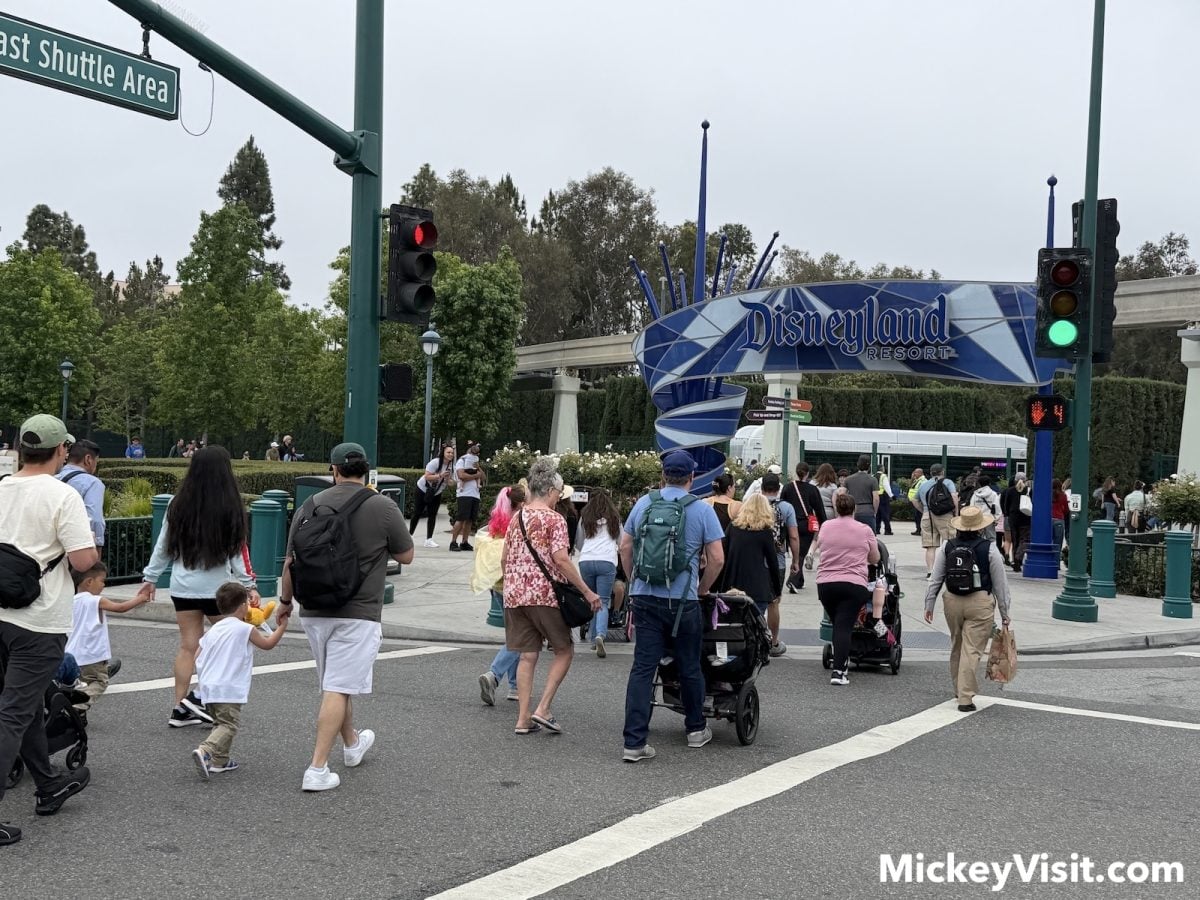 People crossing street in front of Disneyland entrance