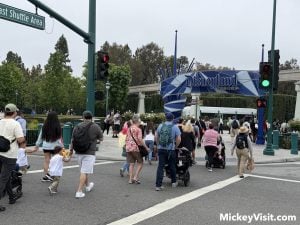 People crossing street in front of Disneyland entrance