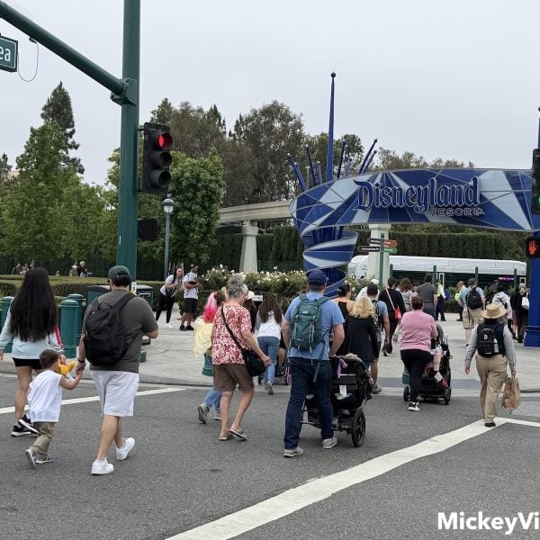 People crossing street in front of Disneyland entrance
