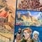 Concept art for mountain of candy, blimp in hangar, old cars, and Milo Thatch explorers