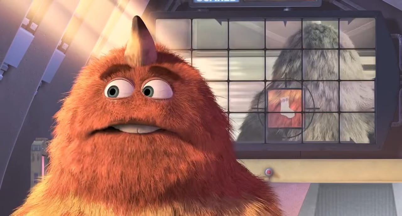 Orange furry monster with a horn
