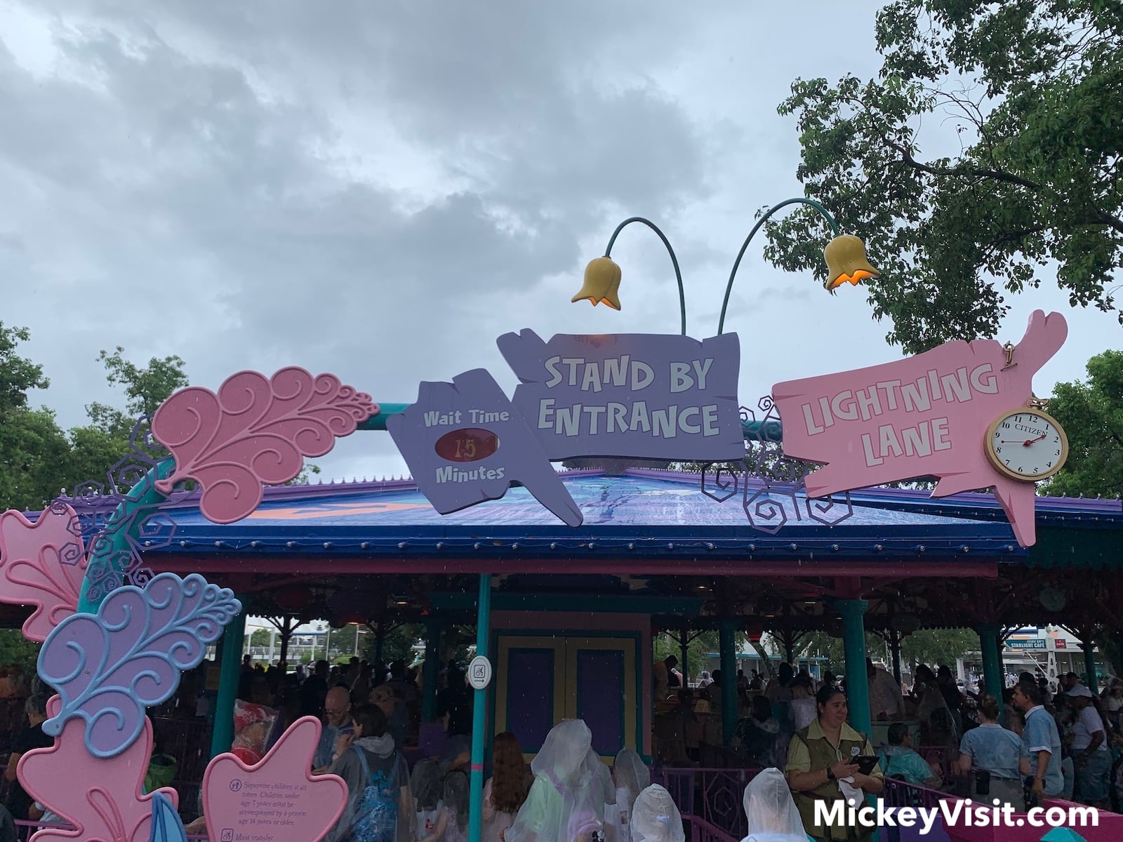 Mad Tea Party sign on overcast day