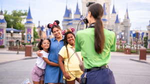 Photographer capturing photo of family at Disney World