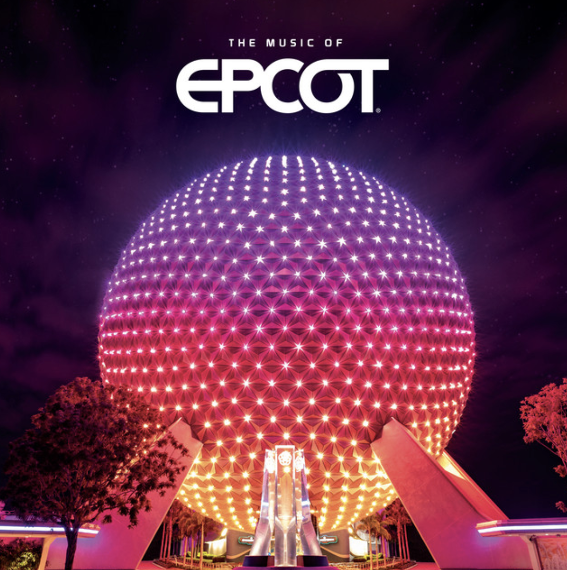 Spaceship Earth dome at night glowing pink and purple