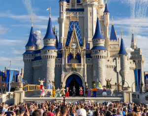 Cinderella Castle with Disney characters and crowd