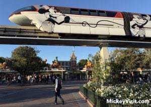 disneyland monorail passing over entrance